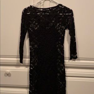 Black lace dress with black slip underlay